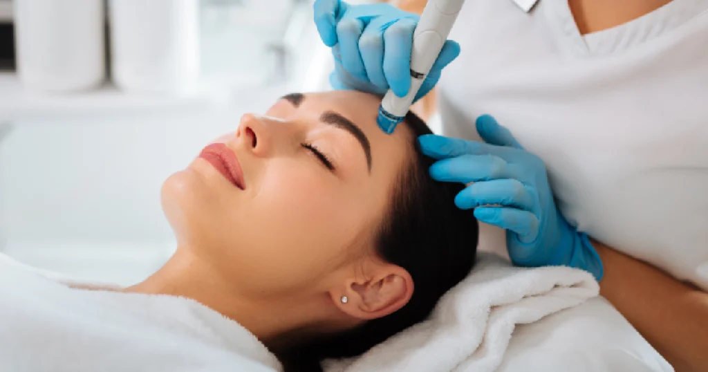 Women receiving skinpen microneedling treatment in Houston